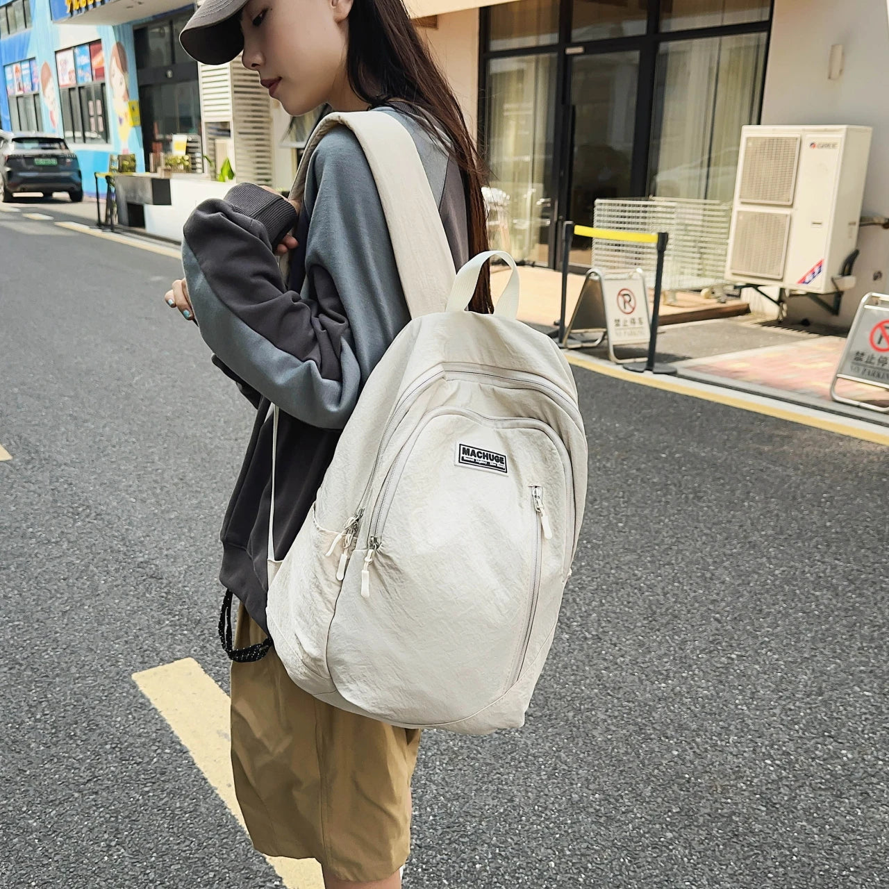 Backpack simple and large-capacity men's and women's travel backpacks leisure summer students waterproof spine backpack.