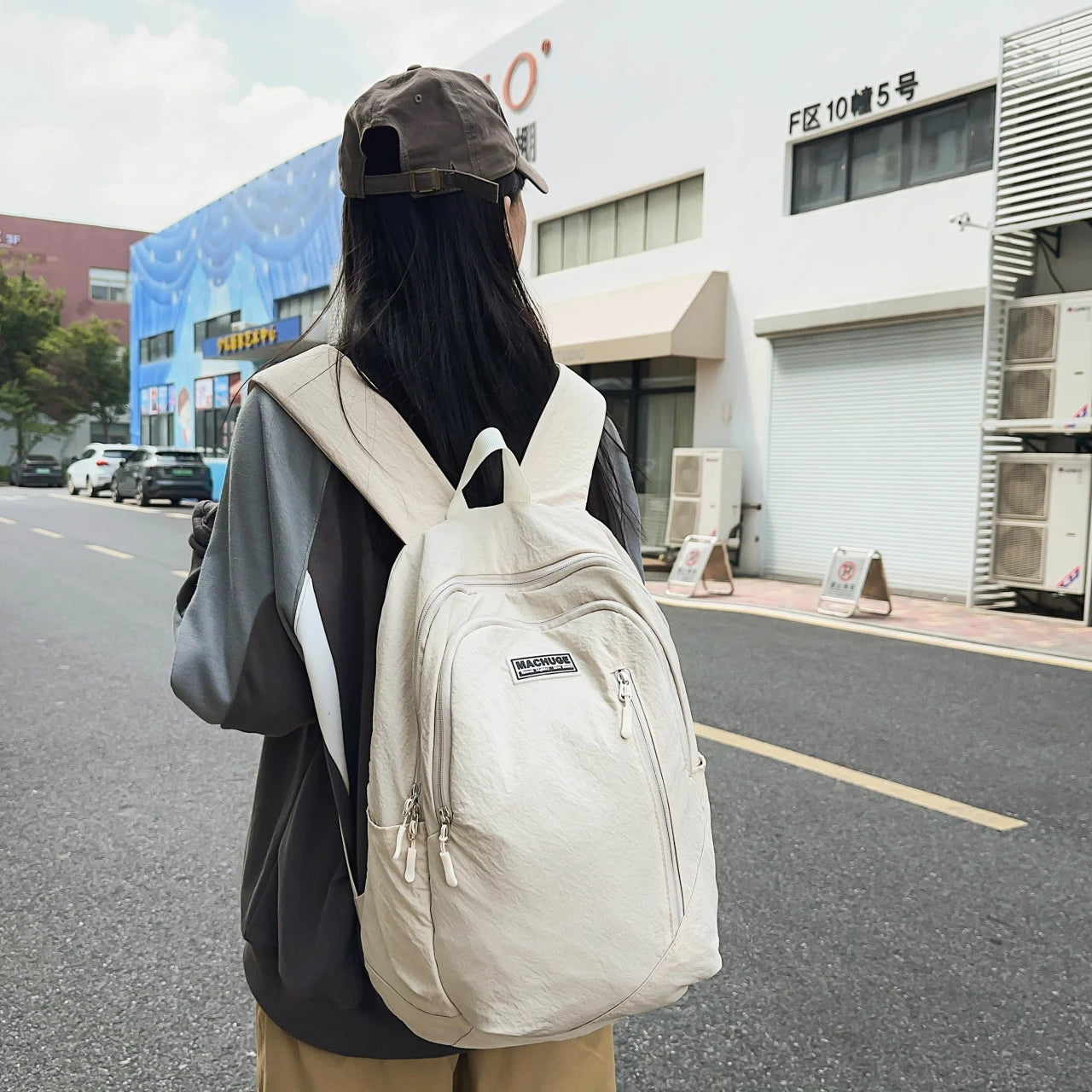 Backpack simple and large-capacity men's and women's travel backpacks leisure summer students waterproof spine backpack.