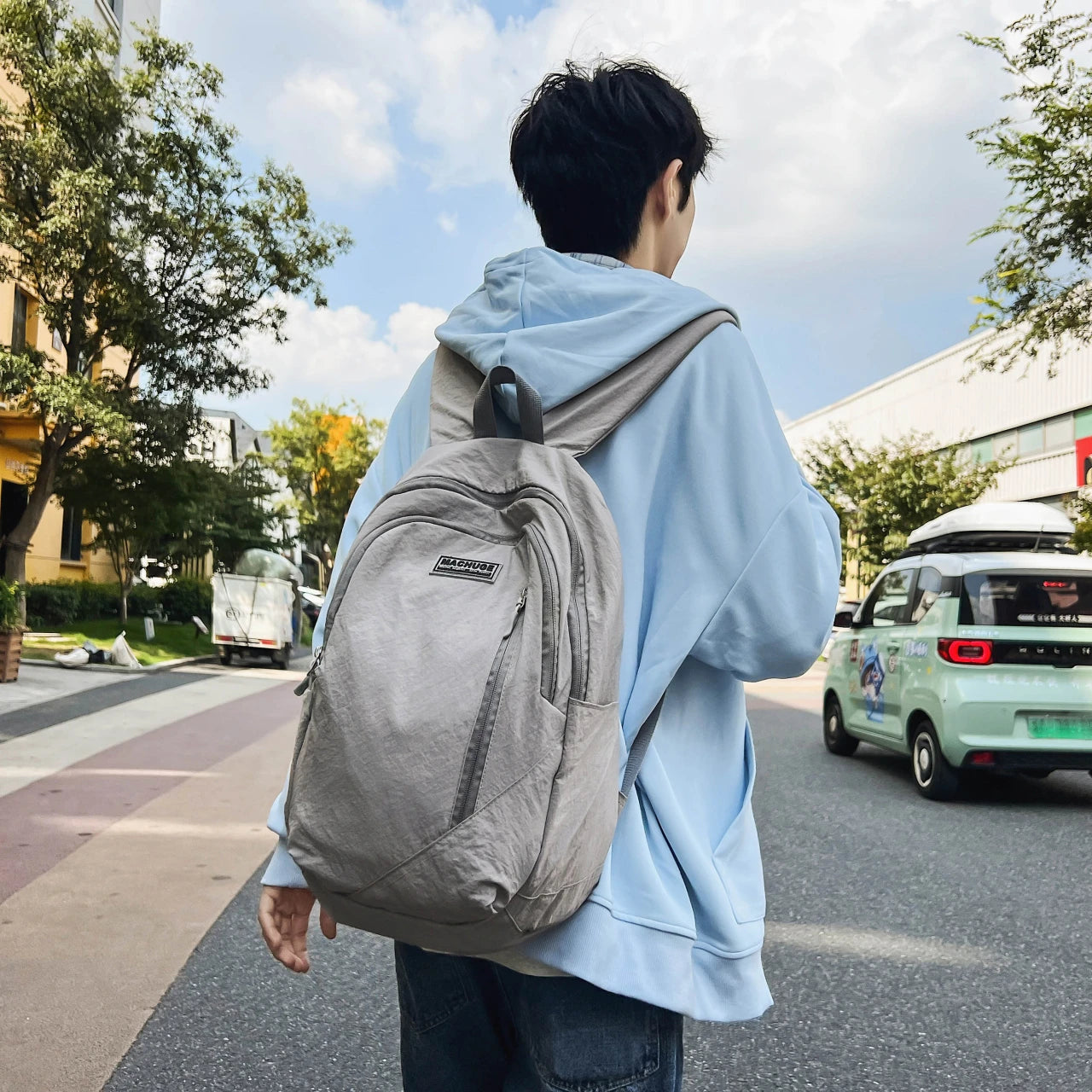 Backpack simple and large-capacity men's and women's travel backpacks leisure summer students waterproof spine backpack.