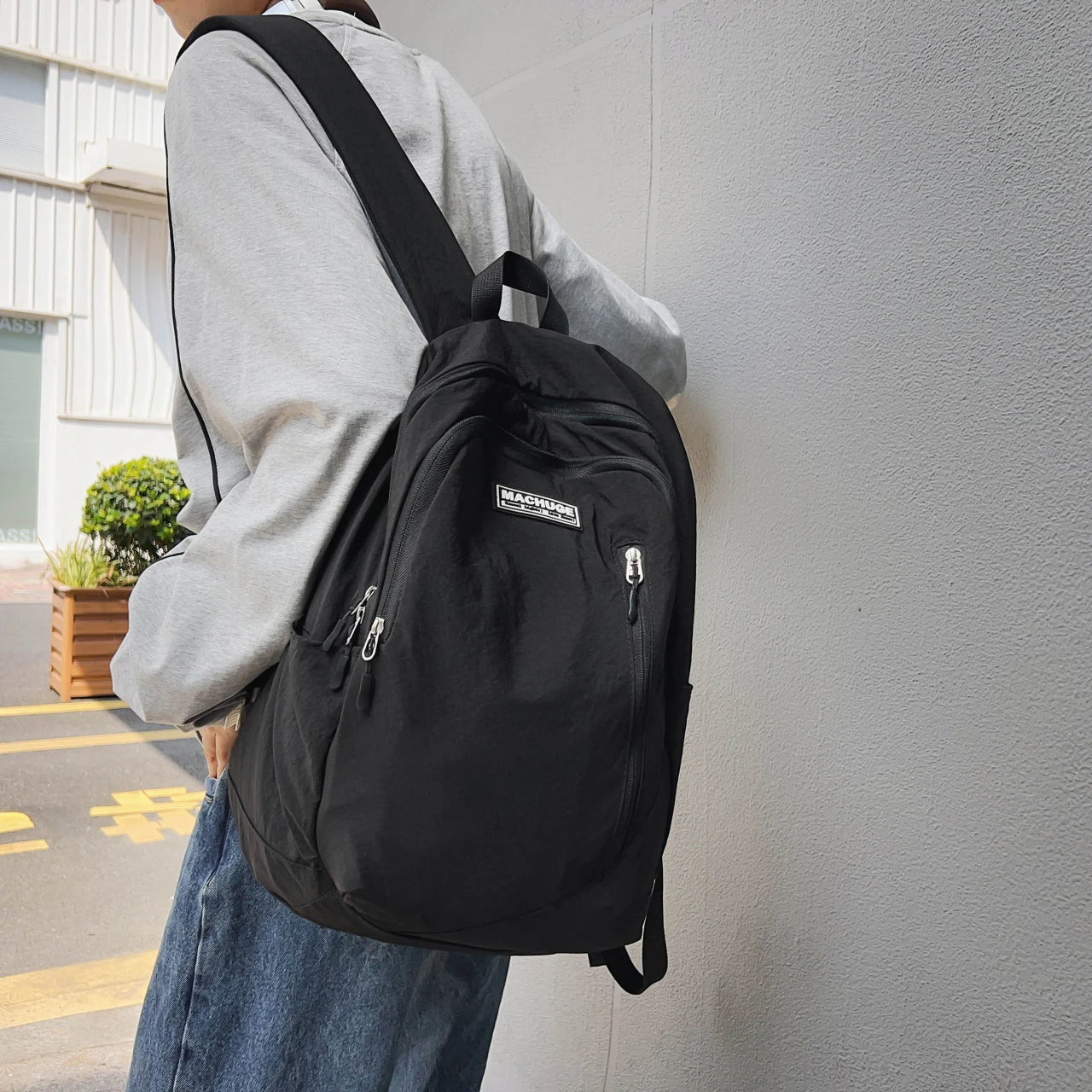 Backpack simple and large-capacity men's and women's travel backpacks leisure summer students waterproof spine backpack.