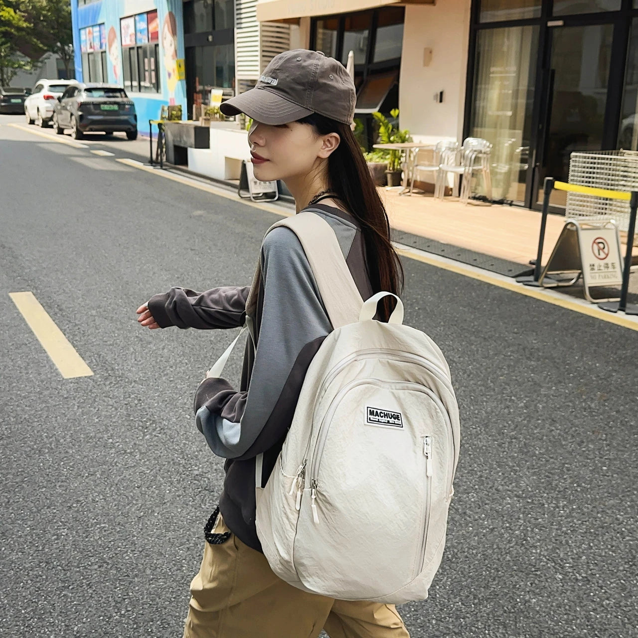 Backpack simple and large-capacity men's and women's travel backpacks leisure summer students waterproof spine backpack.
