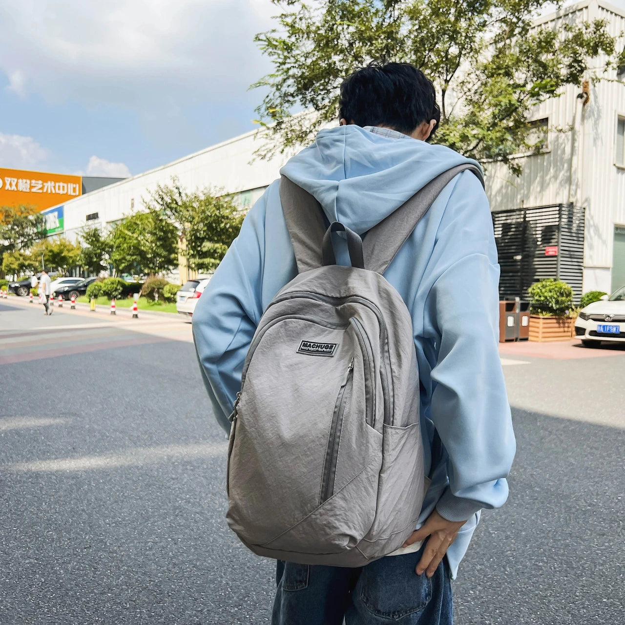 Backpack simple and large-capacity men's and women's travel backpacks leisure summer students waterproof spine backpack.