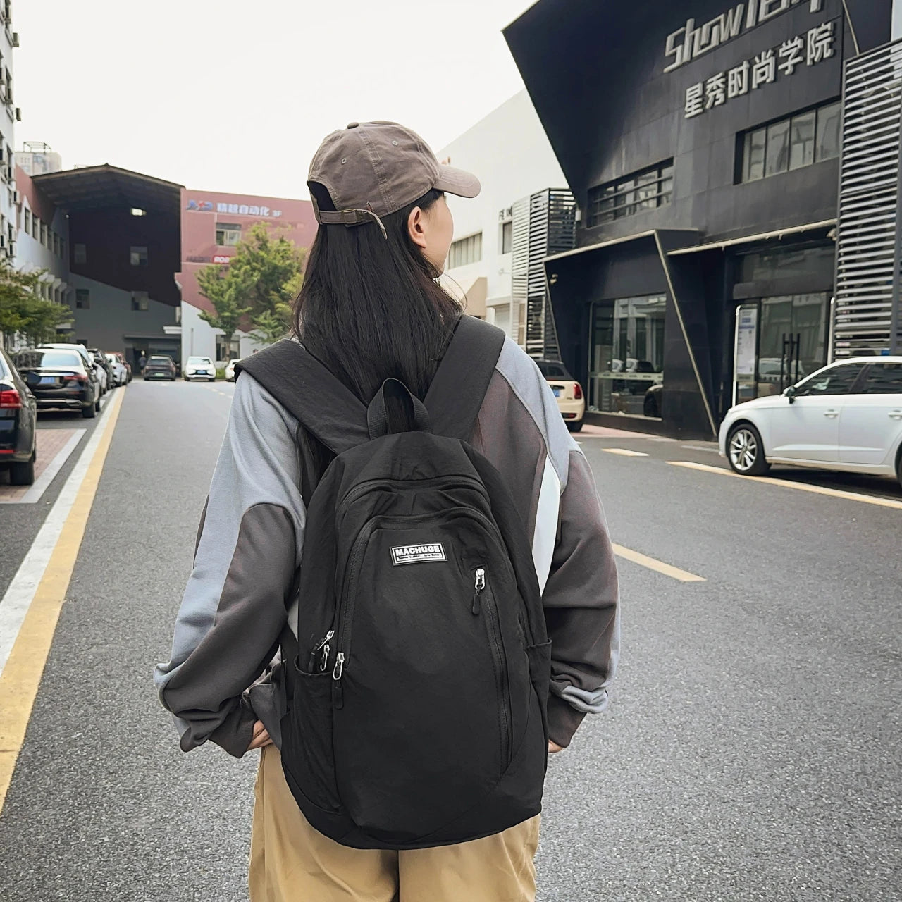 Backpack simple and large-capacity men's and women's travel backpacks leisure summer students waterproof spine backpack.