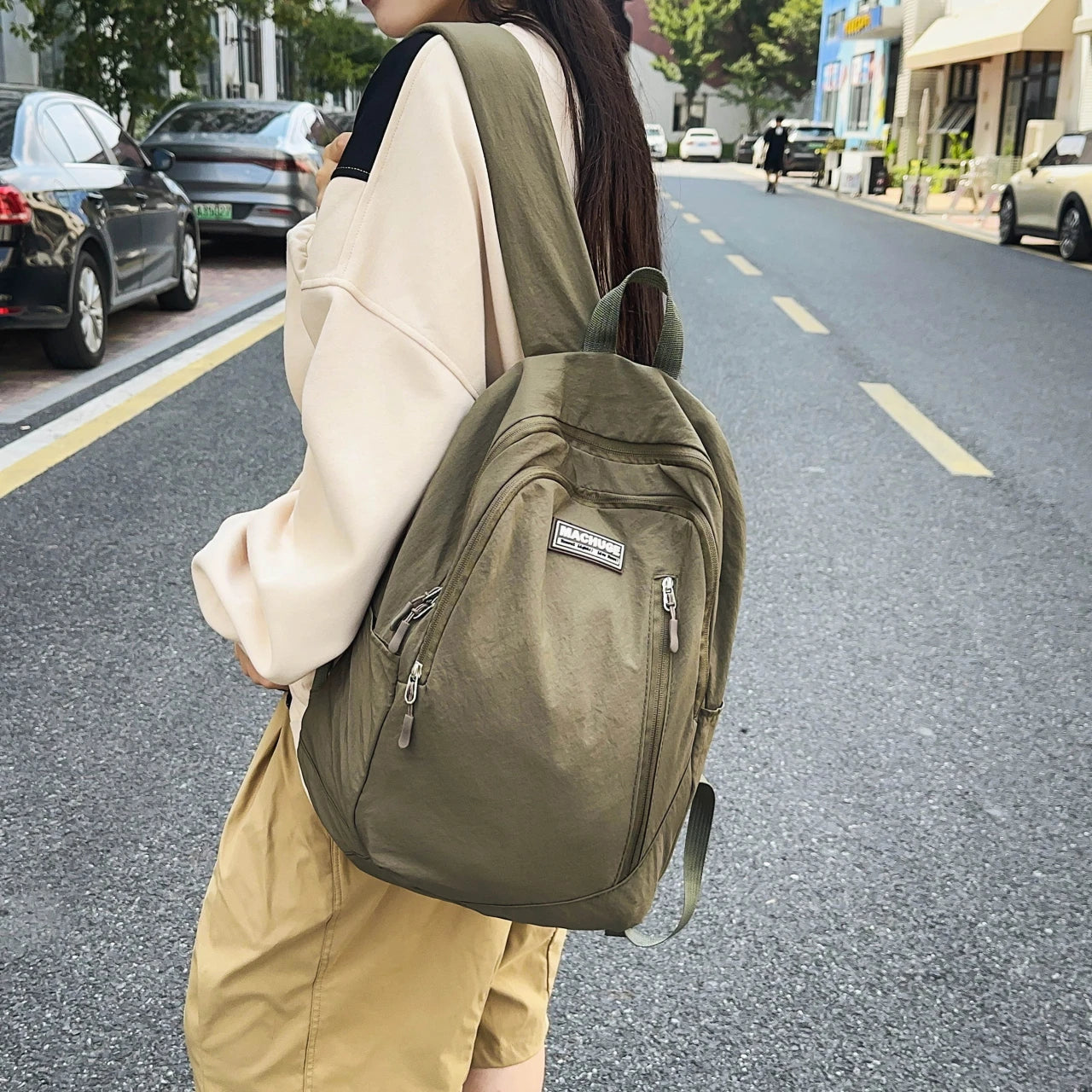 Backpack simple and large-capacity men's and women's travel backpacks leisure summer students waterproof spine backpack.